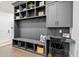 Mudroom with built-in storage, bench seating, and desk area at 2381 Jones Phillips Rd, Dacula, GA 30019