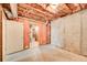 Unfinished basement with exposed insulation and concrete walls, ready for customization at 245 Ashley Forest Dr, Fayetteville, GA 30214