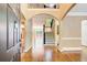 Grand foyer featuring soaring ceilings, hardwood floors, a staircase, and access to multiple living spaces at 245 Ashley Forest Dr, Fayetteville, GA 30214
