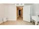 Unfinished utility room with a utility sink, humidifier, and access to another part of the basement at 245 Ashley Forest Dr, Fayetteville, GA 30214