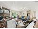 Bright living room featuring a stone fireplace and hardwood floors at 755 Waterbrook Ter, Roswell, GA 30076