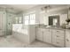 Luxurious bathroom with a glass-enclosed shower, tub, and double vanity at 775 A Harrison Se Pl, Atlanta, GA 30315