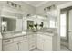 Spacious bathroom with a double vanity, granite countertops, and bright lighting at 775 A Harrison Se Pl, Atlanta, GA 30315