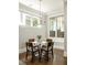 Inviting breakfast nook with hardwood floors and natural light from large windows at 775 A Harrison Se Pl, Atlanta, GA 30315