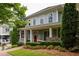 Charming two-story home with a red front door and beautiful landscaping at 775 A Harrison Se Pl, Atlanta, GA 30315