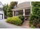 Exterior view of a home featuring a covered front porch and well-maintained landscaping at 775 A Harrison Se Pl, Atlanta, GA 30315