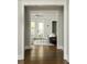 View from the foyer showing a living room with neutral colors and hardwood floors at 775 A Harrison Se Pl, Atlanta, GA 30315