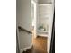Cozy staircase niche features built-in shelves and warm wood floors at 775 A Harrison Se Pl, Atlanta, GA 30315