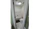 Functional bathroom featuring a combined tub and shower, with tiled walls at 1042 Emory Parc Pl, Decatur, GA 30033