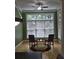 Bright breakfast nook with hardwood floors, a ceiling fan, and a large window offering great light at 1042 Emory Parc Pl, Decatur, GA 30033