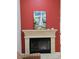 Close up of the living room fireplace with decorative mantel and hearth at 1042 Emory Parc Pl, Decatur, GA 30033