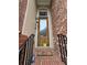 Charming front entrance with a decorative door, brick accents, and a welcoming mat at 1042 Emory Parc Pl, Decatur, GA 30033