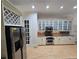 Well-equipped kitchen featuring stainless steel appliances, granite countertops, and ample storage, ready for culinary adventures at 1042 Emory Parc Pl, Decatur, GA 30033