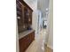 Beautiful kitchen with granite countertops, wooden cabinets, and hardwood floors, offering a blend of style and functionality at 1042 Emory Parc Pl, Decatur, GA 30033