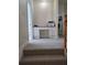 Upstairs landing with a desk area and views of the laundry room down the hall at 1042 Emory Parc Pl, Decatur, GA 30033