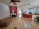 Spacious living room featuring a fireplace and open floor plan to the kitchen at 1042 Emory Parc Pl, Decatur, GA 30033