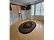 Formal living room with hardwood floors, wainscoting, and pendant lighting at 1042 Emory Parc Pl, Decatur, GA 30033