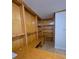 Home office with built-in shelves, a large desk, and storage cabinets at 1042 Emory Parc Pl, Decatur, GA 30033