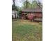 Backyard area with a deck and storage shed at 2137 Plantation Ln, Chamblee, GA 30341