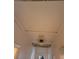 Ceiling view of a hallway showing a utility access and a light fixture at 2137 Plantation Ln, Chamblee, GA 30341