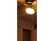 A low angle view of a lighted ceiling fan with pull chains at 2137 Plantation Ln, Chamblee, GA 30341