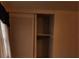 Empty closet with folding doors and a single shelf with some space for storage at 2137 Plantation Ln, Chamblee, GA 30341