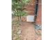 Outdoor view of a small access door and the brick exterior at 2137 Plantation Ln, Chamblee, GA 30341