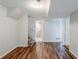 Finished basement featuring staircase, bathroom, wood-look floors and neutral paint at 2347 Fairway Sw Cir, Atlanta, GA 30331