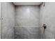 Contemporary bathroom shower with gray tiling and a built-in seat at 2347 Fairway Sw Cir, Atlanta, GA 30331