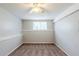 Bedroom with carpet, a ceiling fan, neutral paint and natural light from a window at 2347 Fairway Sw Cir, Atlanta, GA 30331