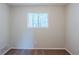 Bedroom features neutral color walls, carpeted floor, and a bright window at 2347 Fairway Sw Cir, Atlanta, GA 30331