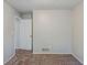 Empty bedroom features plush carpet, neutral paint, and a white trim at 2347 Fairway Sw Cir, Atlanta, GA 30331