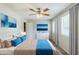 Stylishly staged bedroom featuring updated furnishings, ceiling fan, and natural light at 2347 Fairway Sw Cir, Atlanta, GA 30331