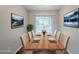 Virtually staged dining room featuring wood floors, and plenty of light at 2347 Fairway Sw Cir, Atlanta, GA 30331