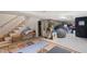 Finished basement featuring workout area, storage, stairs and utilities at 2840 Peachtree Nw Rd # 307, Atlanta, GA 30305