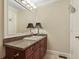 The bathroom features a sink with modern fixtures, a vanity, and neutral walls at 2840 Peachtree Nw Rd # 307, Atlanta, GA 30305