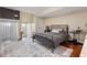 Upstairs loft bedroom area featuring a comfortable bed and with unique design elements throughout at 2840 Peachtree Nw Rd # 307, Atlanta, GA 30305