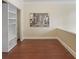 Bright bedroom featuring hardwood floors and built in shelving at 2840 Peachtree Nw Rd # 307, Atlanta, GA 30305