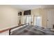 A bright bedroom showcasing a cozy bed, wood floors, and a unique layout at 2840 Peachtree Nw Rd # 307, Atlanta, GA 30305