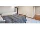 Upstairs loft bedroom area featuring a comfortable bed, a unique design, and cozy charm at 2840 Peachtree Nw Rd # 307, Atlanta, GA 30305