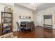 Cozy dining area featuring hardwood floors, decorative shelving, and a stylish marble-topped table at 2840 Peachtree Nw Rd # 307, Atlanta, GA 30305