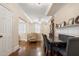 Dining area with hardwood floors, with views of the living room and built-in fireplace at 2840 Peachtree Nw Rd # 307, Atlanta, GA 30305