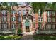 Beautiful brick apartment building with meticulously maintained landscaping and a stately entrance at 2840 Peachtree Nw Rd # 307, Atlanta, GA 30305