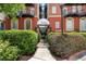 Beautiful apartment complex with manicured hedges and a covered walkway leading to the building entrance at 2840 Peachtree Nw Rd # 307, Atlanta, GA 30305