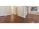 Cozy living room with hardwood floors, neutral paint, and a walk-in closet at 2840 Peachtree Nw Rd # 307, Atlanta, GA 30305