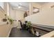 Multi-level office with black floors, providing a functional and creative workspace filled with natural light at 2840 Peachtree Nw Rd # 307, Atlanta, GA 30305