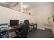 Upstairs office space offering a comfortable workspace with black floors, a large desk, and natural lighting at 2840 Peachtree Nw Rd # 307, Atlanta, GA 30305
