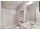 Bathroom with vanity, tub/shower combo, and built-in shelving at 627 New England Way, Lawrenceville, GA 30046