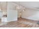 A view of an open living area between the kitchen and living room of the home at 627 New England Way, Lawrenceville, GA 30046