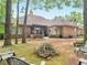 View of the backyard with outdoor seating and fire pit at 1466 Lake Forest Ln, Mcdonough, GA 30253